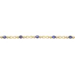 A sapphire and diamond bracelet.Estimated total diamond weight 0.40ct.