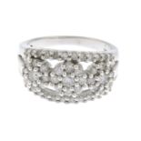 A brilliant-cut diamond openwork dress ring.Estimated total diamond weight 0.75ct,