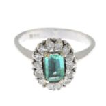 An emerald and single-cut diamond cluster ring.Emerald calculated weight 0.50ct,