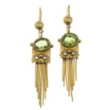 A pair of peridot earrings.Stamped 9CT, partially indistinct.