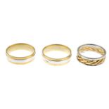 Three 9ct gold bi-colour rings.Hallmarks for 9ct gold.