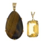 Tiger's-eye pendant, stamped 9CT, length 5.5cms, total weight 17.9gms.