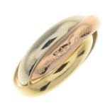 A 'Les Must de Cartier Trinity' ring, by Cartier.Signed Cartier.Stamped 750.Ring size K1/2.