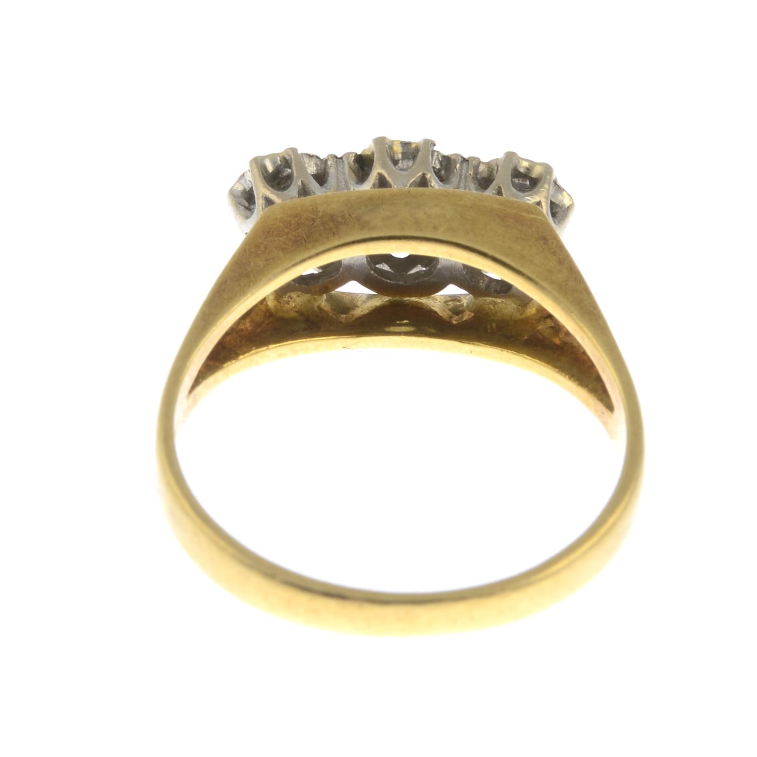 An 18ct gold diamond three-stone ring.Estimated total diamond weight 0.25ct. - Image 2 of 3