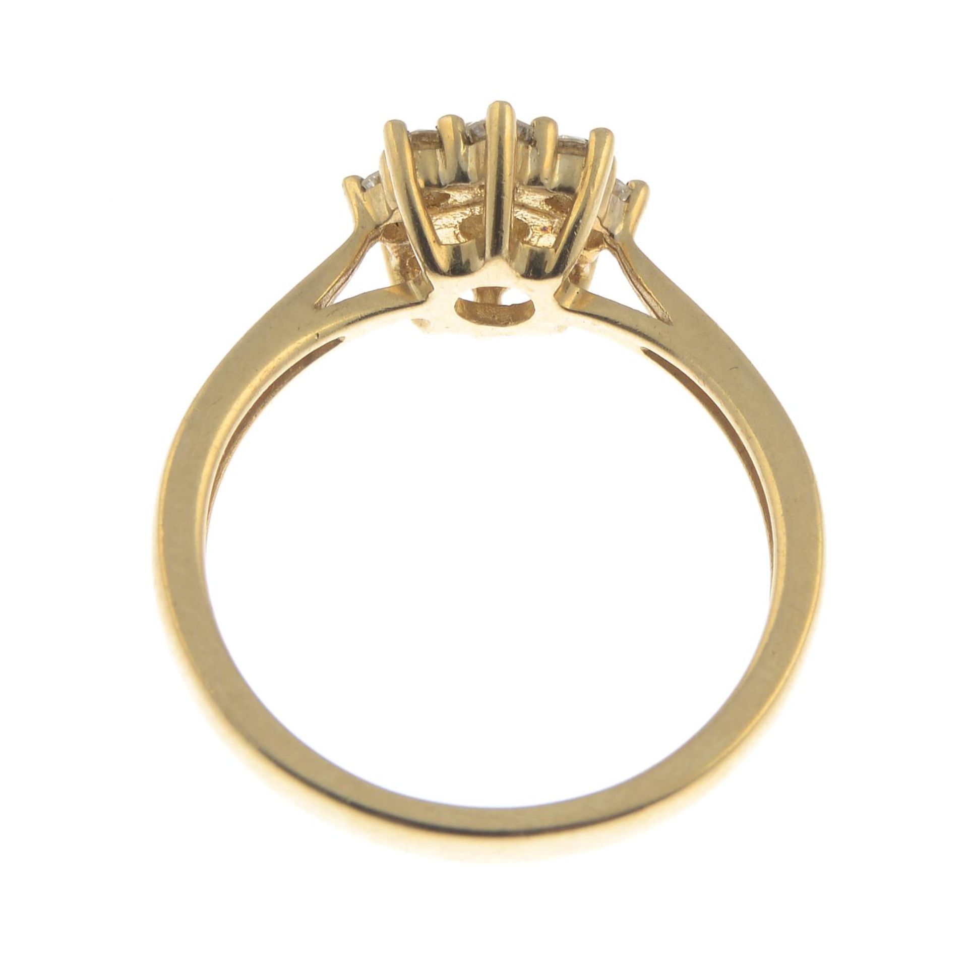 A 9ct gold diamond floral cluster ring.Total diamond weight 0.50ct, stamped to band. - Image 2 of 3