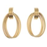 A pair of 9ct gold earrings.Hallmarks for 9ct gold.