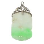 A carved jade pendant, depicting a lotus flower.Length 7.3cms.