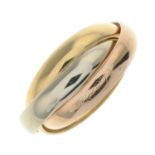 A 'Les Must de Cartier Trinity' ring, by Cartier.Signed Cartier, 478983.Stamped 750.Ring size K.