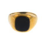 A 9ct gold onyx signet ring.Hallmarks for 9ct gold.