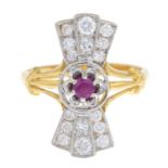 An 18ct gold ruby and diamond dress ring.Estimated total diamond weight 0.60ct.