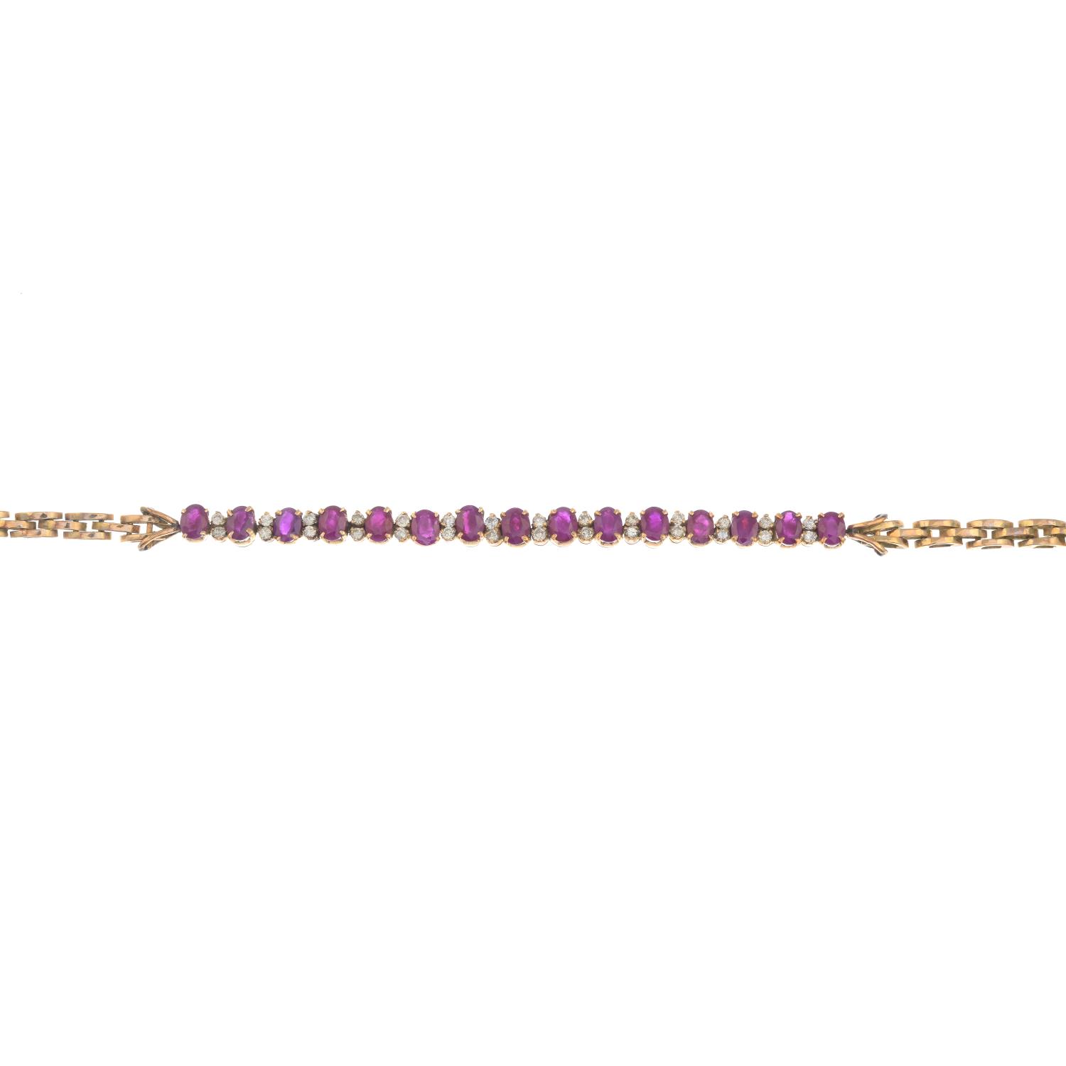 A ruby and brilliant-cut diamond bracelet.Estimated total diamond weight 0.25ct.Length 18cms.