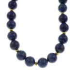 A lapis lazuli necklace, with textured disc spacers.