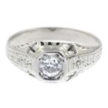 A circular-cut diamond single-stone ring,