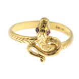 An 18ct gold snake ring, with ruby eyes detail.Hallmarks for 18ct gold.