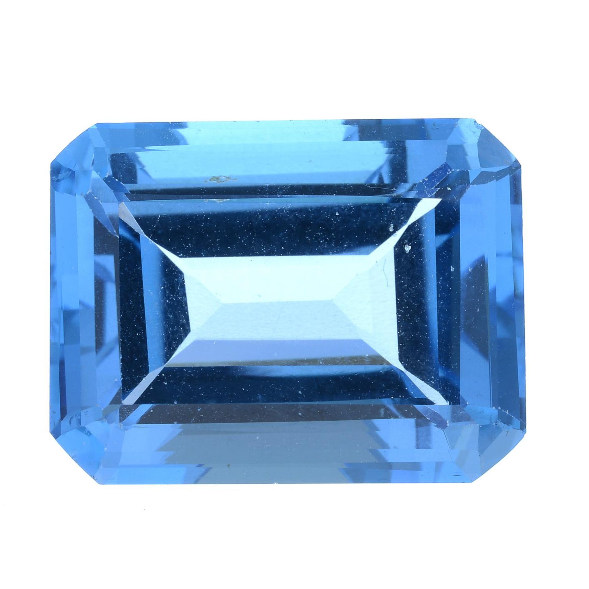 A rectangular-shape blue topaz.
