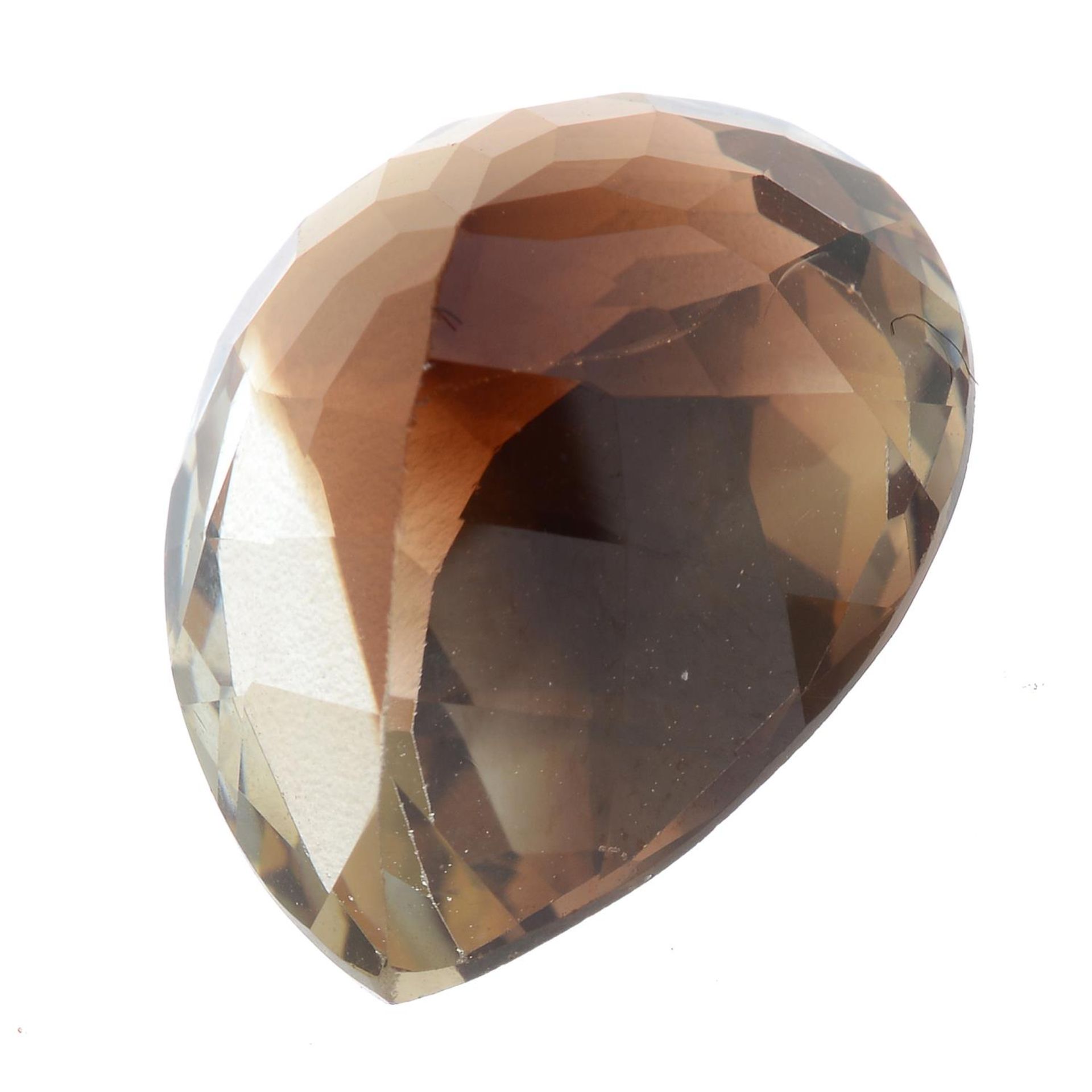 A pear-shape brown topaz. - Bild 2 aus 2