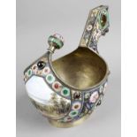 An early 20th century Russian silver and enamel kovsh,