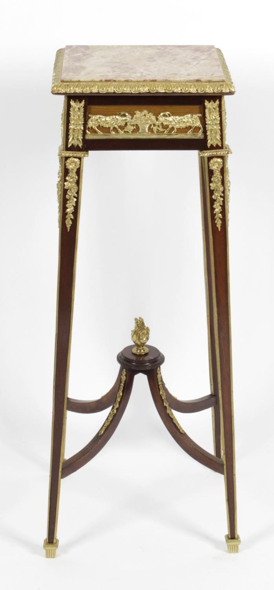 An early 20th century mahogany torchère,