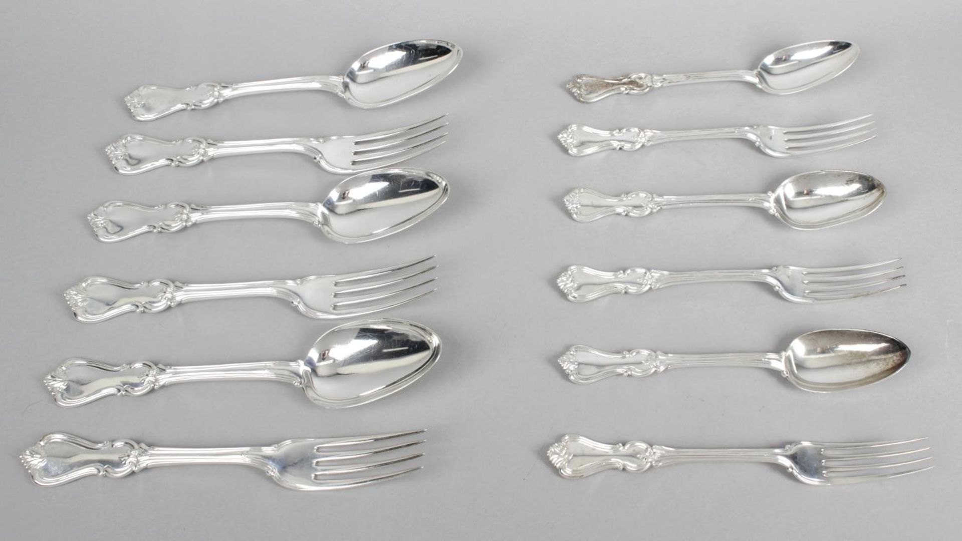 An early Victorian silver part canteen,