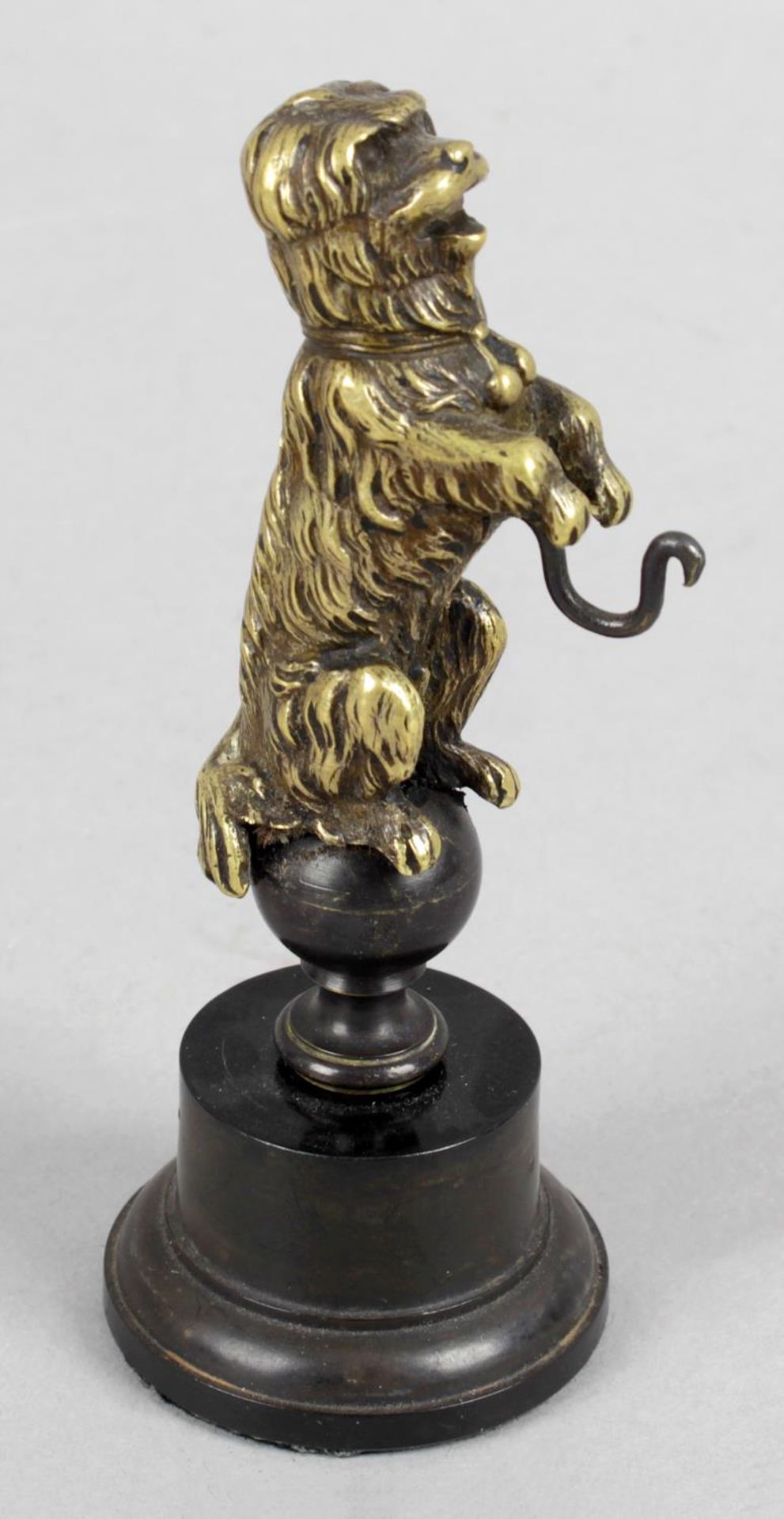 A 19th century bronze pocket watch stand,