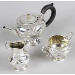 A mid-Victorian silver three piece bachelor tea set,