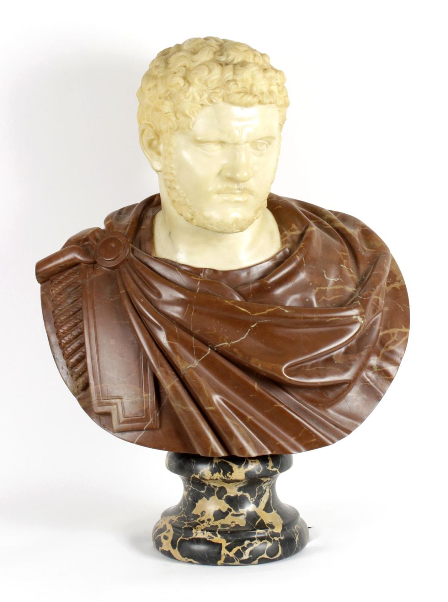 A late 20th century life size carved marble head and shoulders bust by Raniero Sambuci,