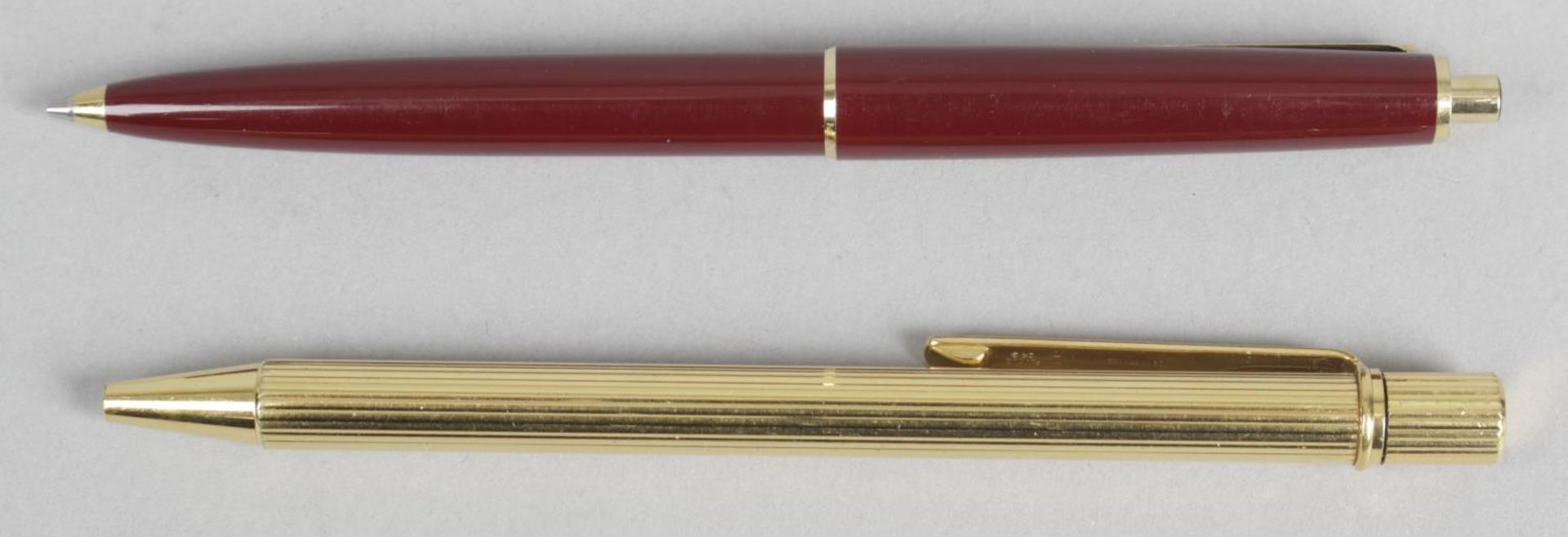 A gold plated Must de Cartier ballpoint pen,