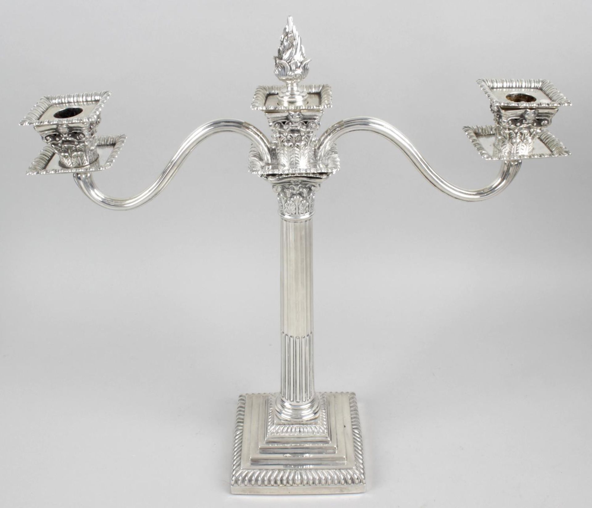 A composite Victorian silver candelabrum,