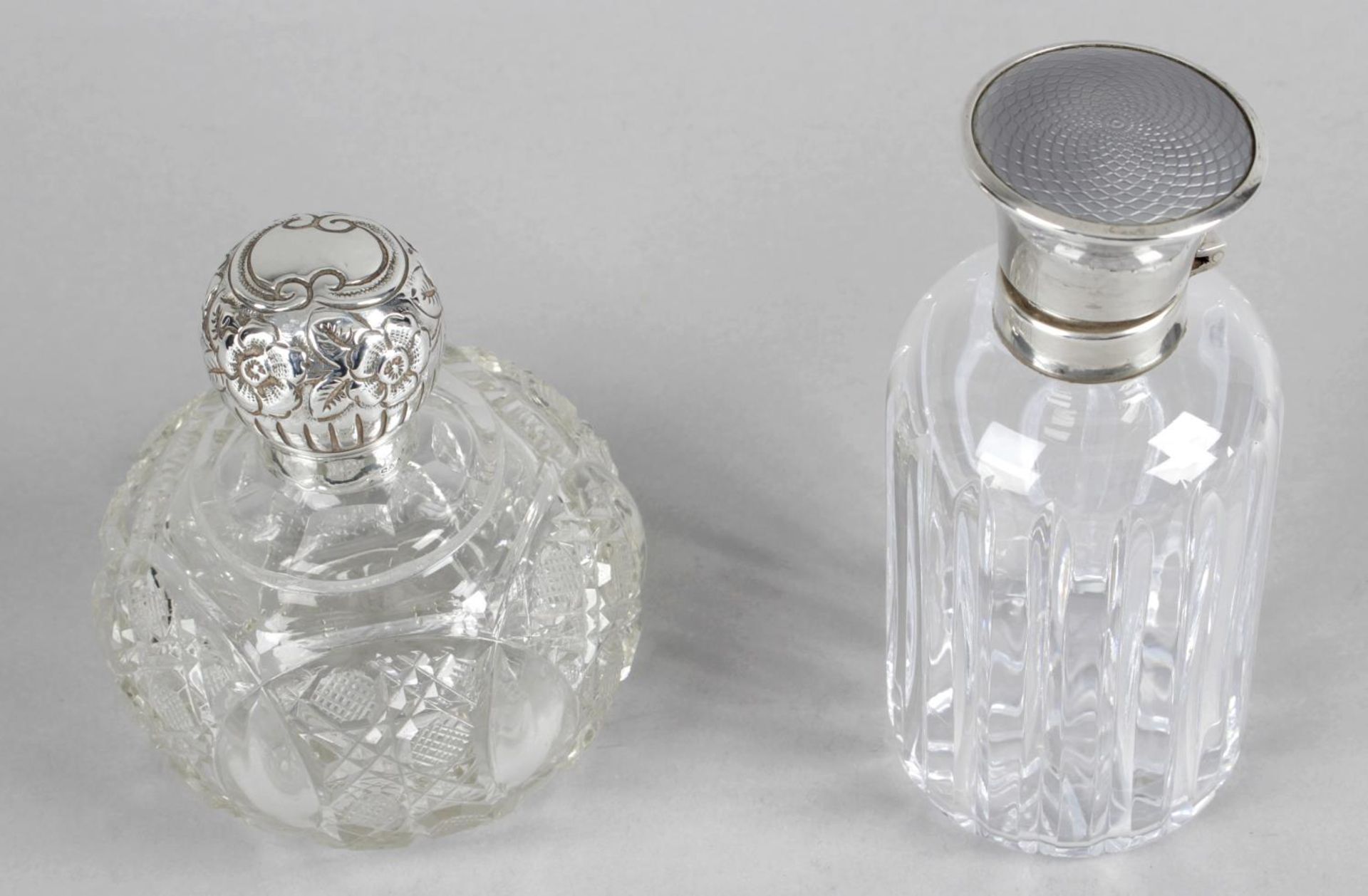 A late Victorian silver mounted glass perfume bottle,