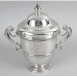 An early 18th century Irish silver twin-handled cup and cover,