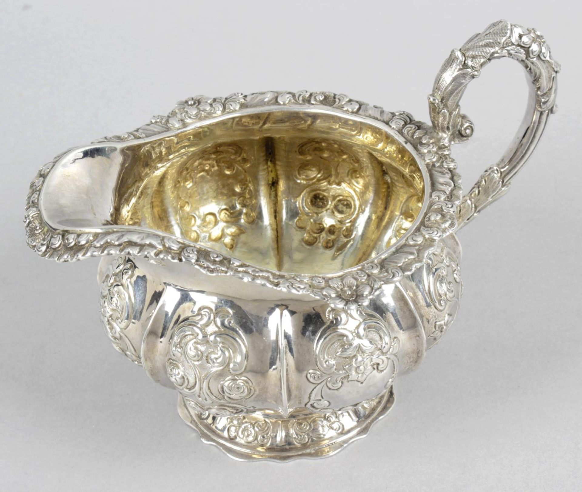 A William IV silver pedestal cream jug,