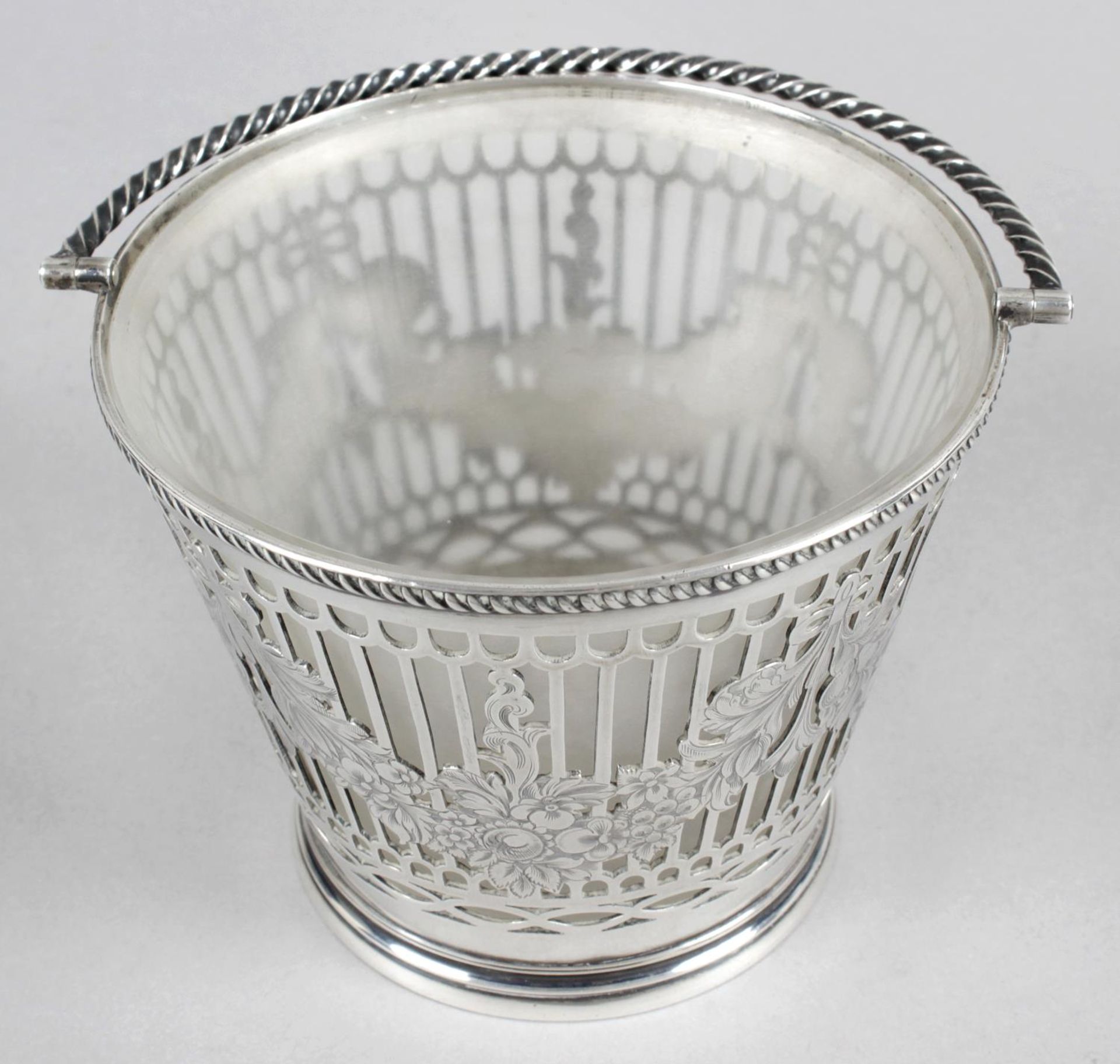 A mid-Victorian silver sugar basket modelled as a pail,