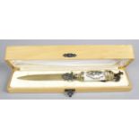 A Russian silver-gilt and enamel paper knife,
