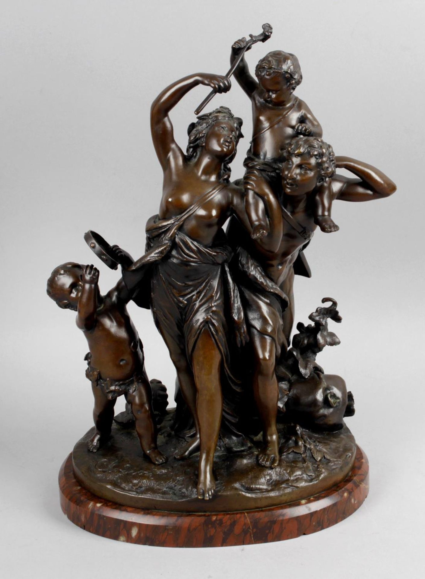 A cast bronze figure group by Clodion entitled 'Triumph of Bacchus',