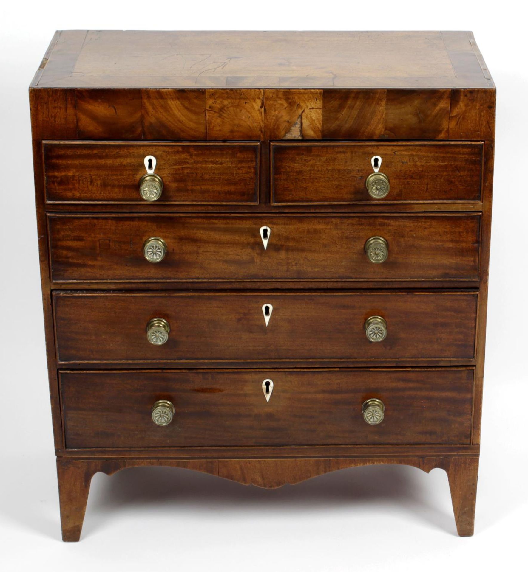 A 19th century mahogany chest of two short over three long graduated cockbeaded drawers,