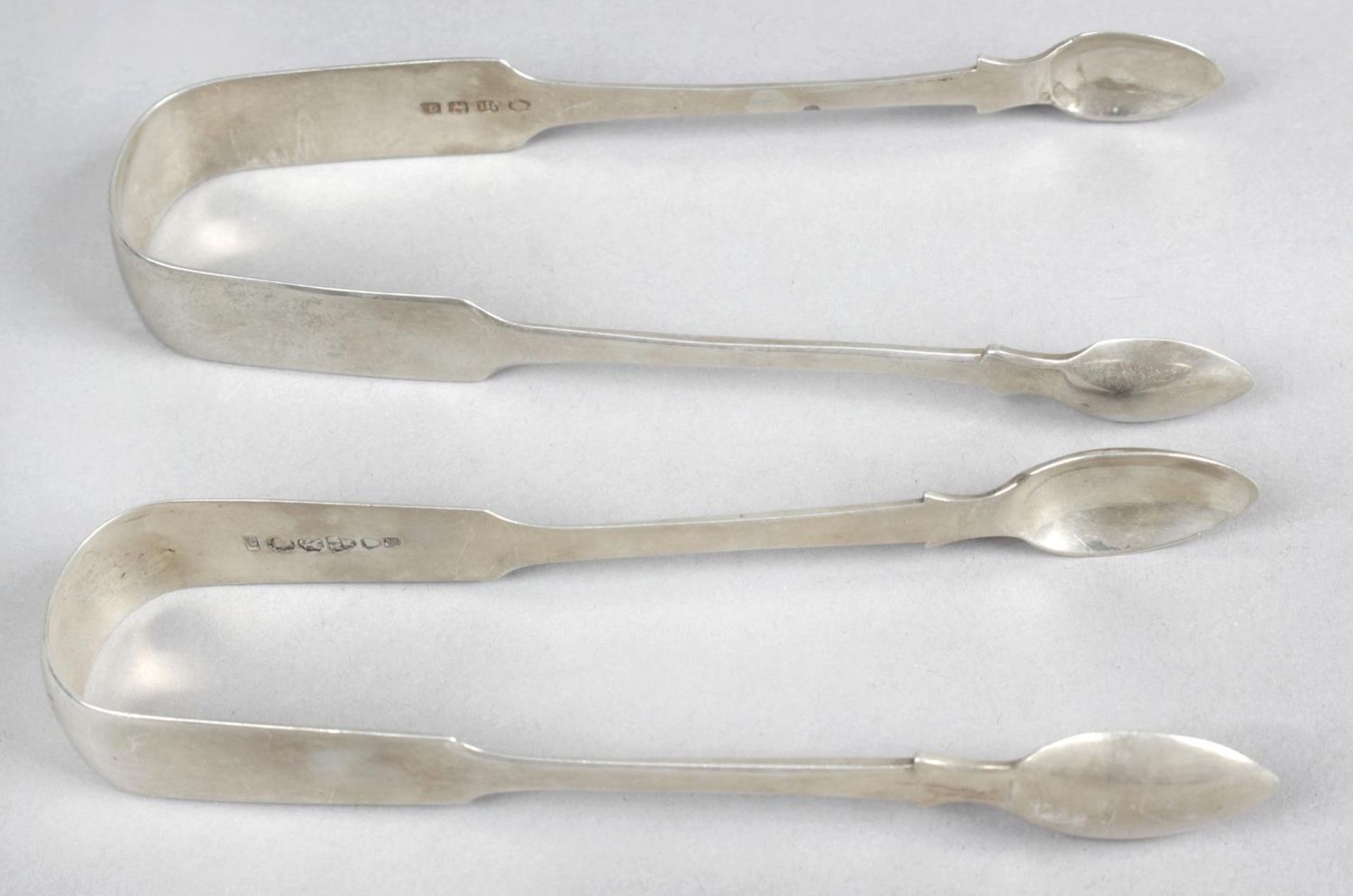 A pair of William IV silver sugar tongs,