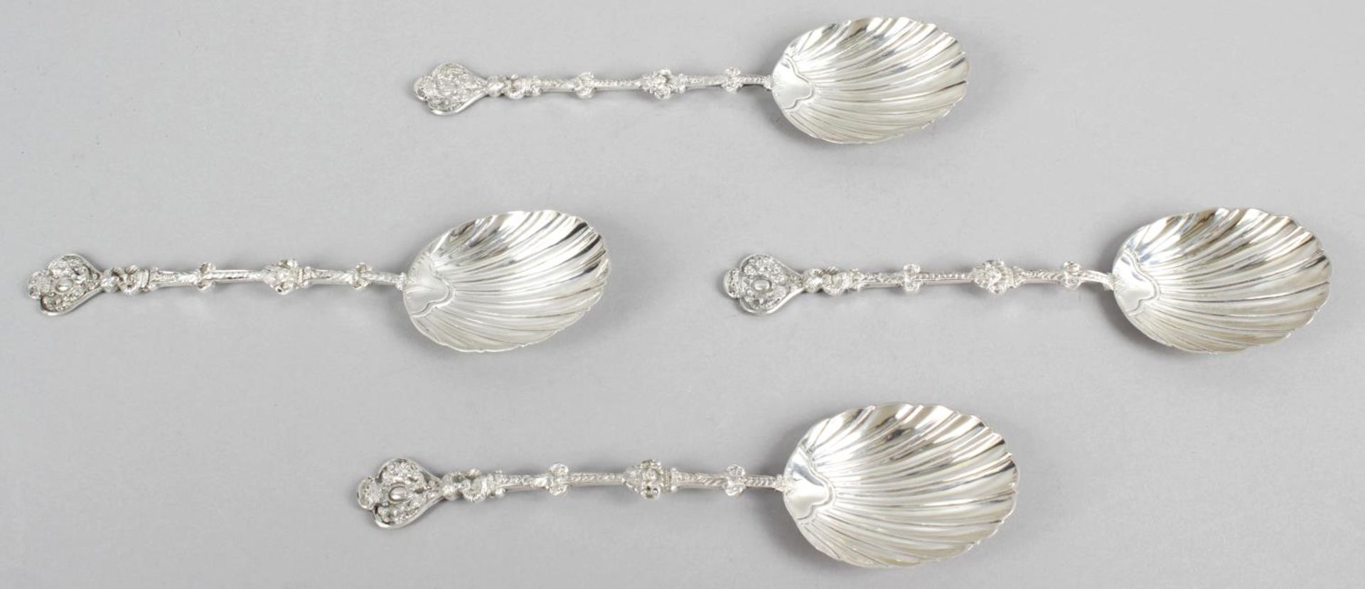 A matched set of four late Victorian silver serving spoons,