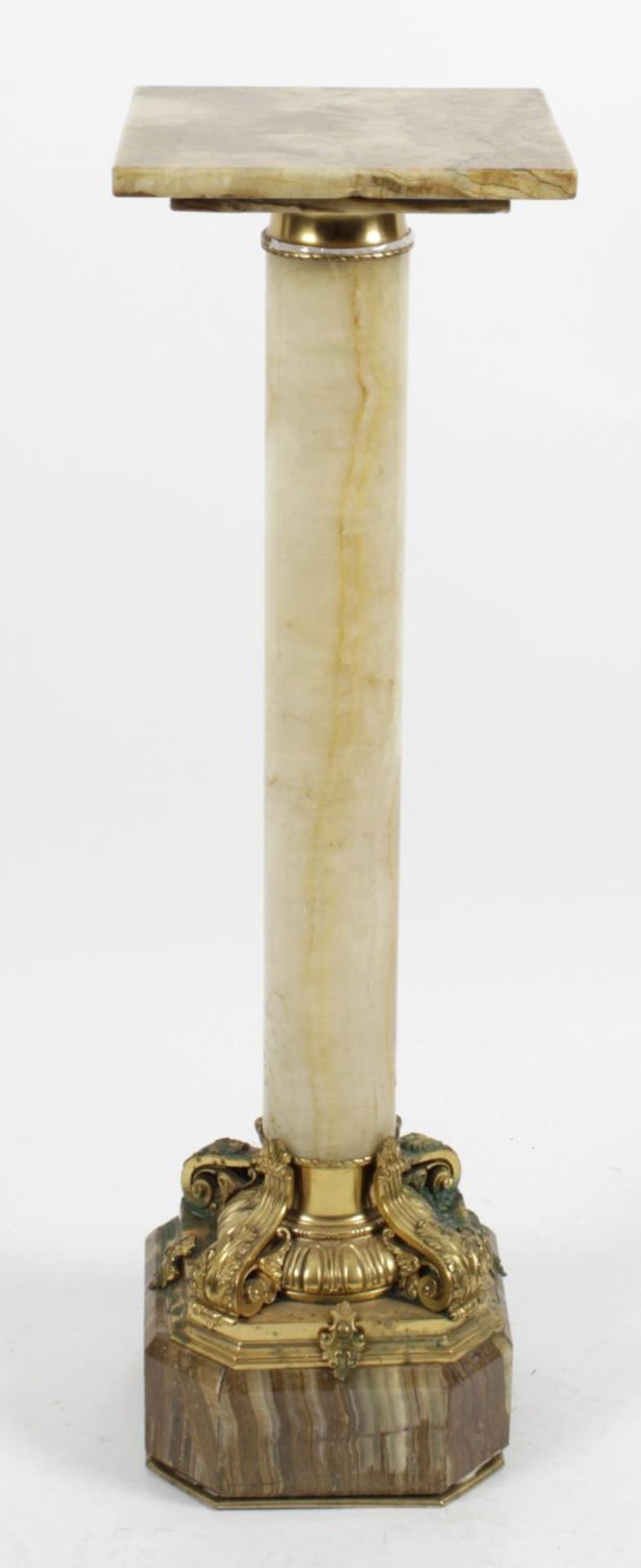 A marble and gilt metal mounted torchère,