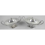 A pair of George III silver sauce tureens,