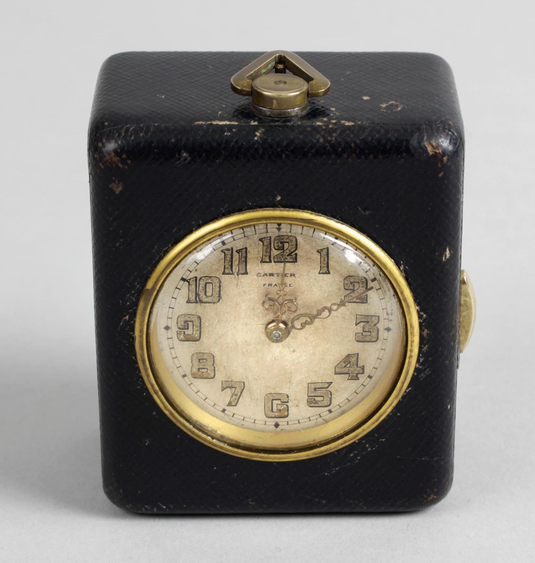 An unusual late 19th century/early 20th century pocket travel clock,