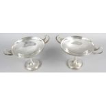 A pair of early George V silver twin-handled tazza dishes in Art Nouveau style,