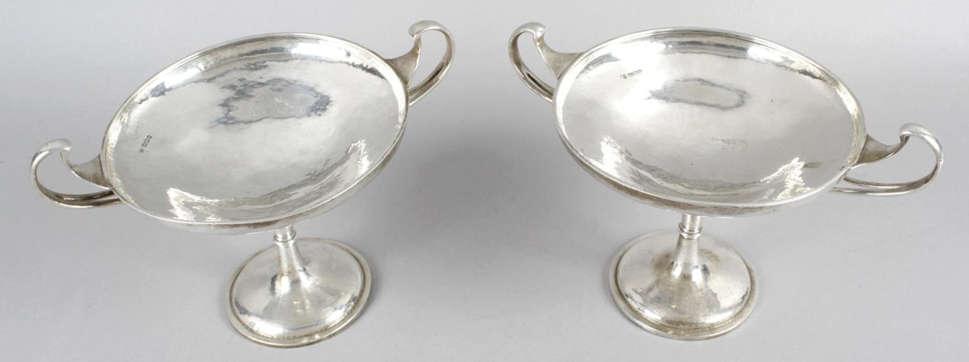 A pair of early George V silver twin-handled tazza dishes in Art Nouveau style,