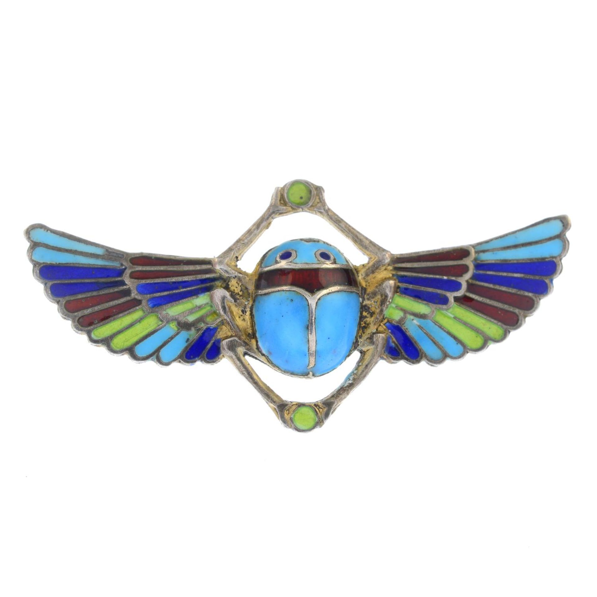 A vari-hue enamel scarab brooch.