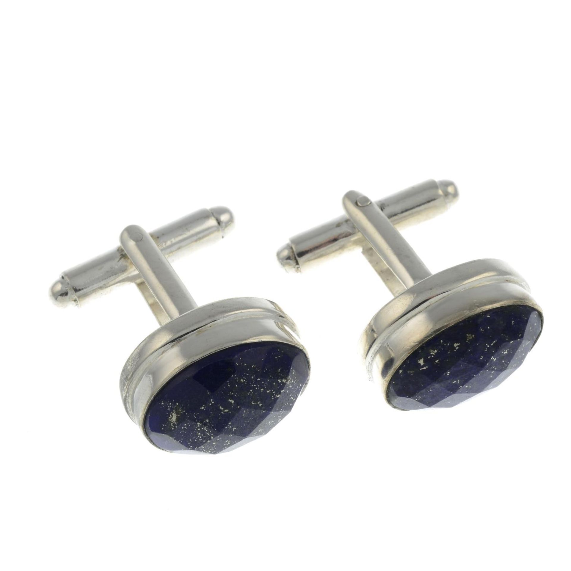 A pair of lapis lazuli cufflinks.Stamped 9ZS.