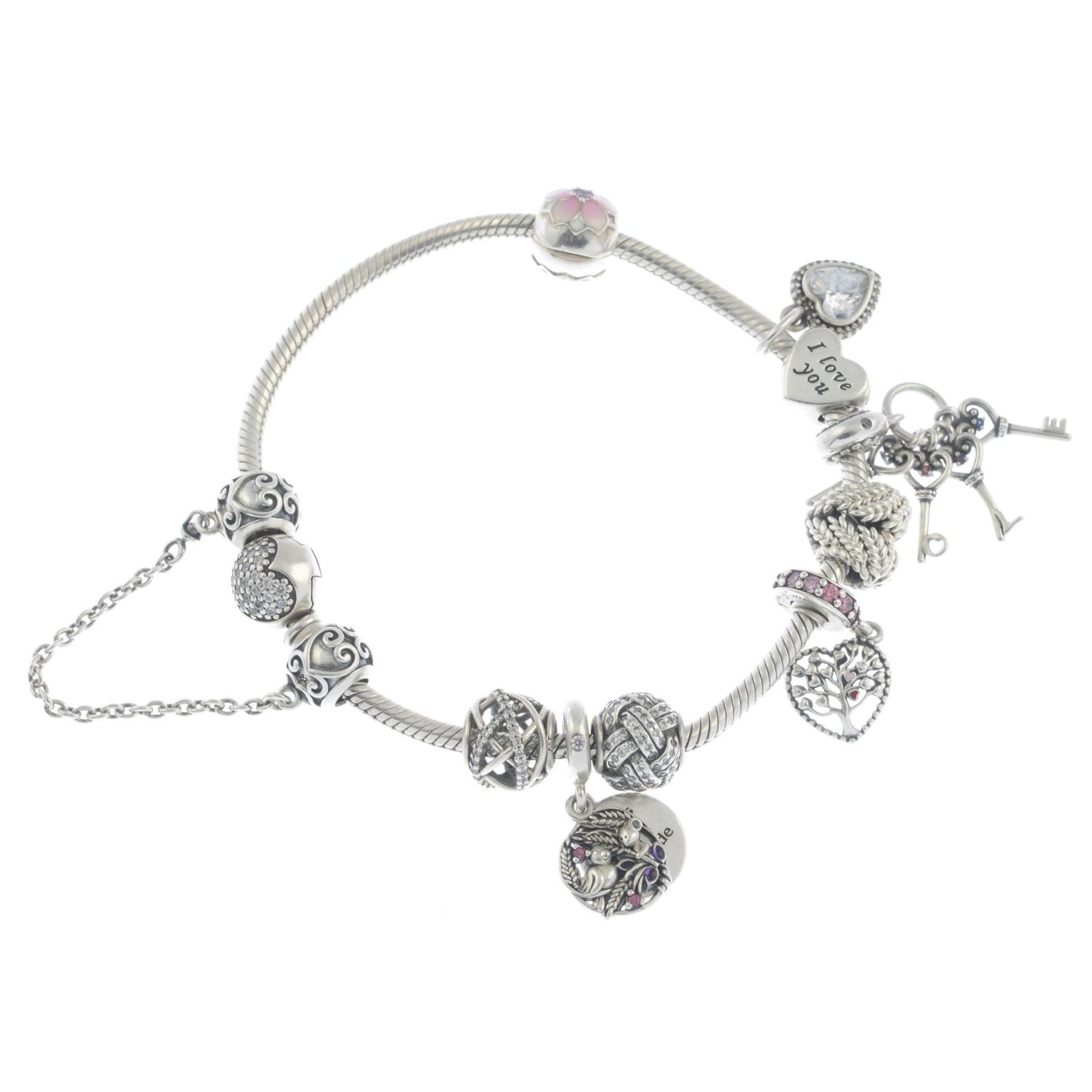 A silver charm bracelet,