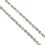 A silver rope chain necklace.