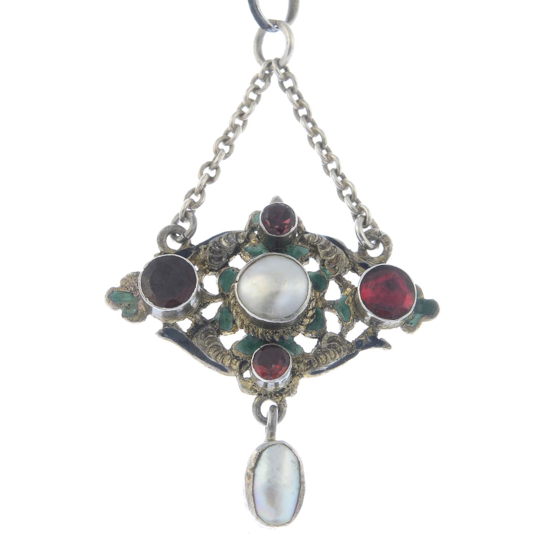 An Austro-Hungarian enamel, garnet and split pearl necklace.