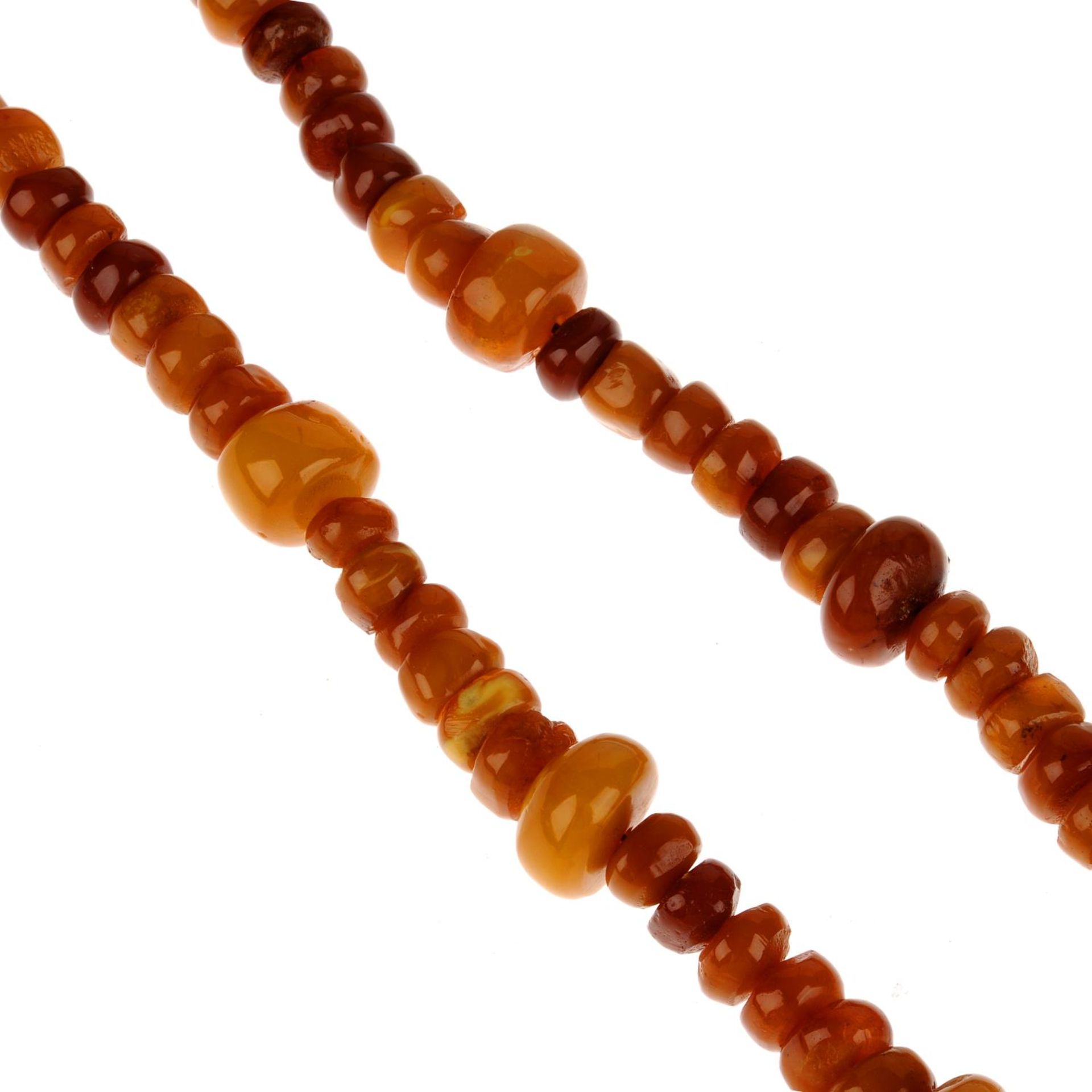 A natural Baltic amber necklace.Beads measuring 1 to 2.4cms.