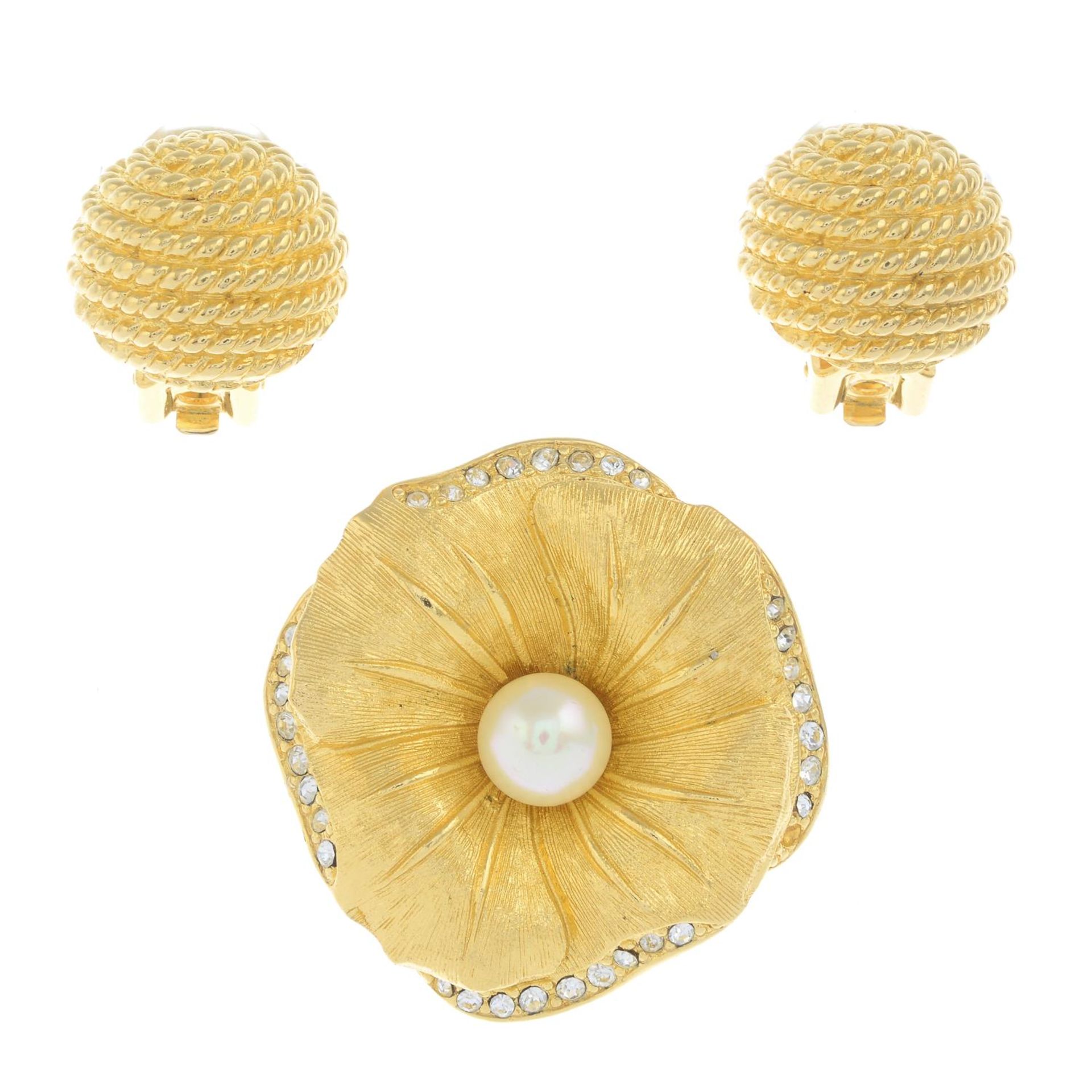 A brooch and a pair of clip-on earrings, by Christian Dior.Signed Chr.