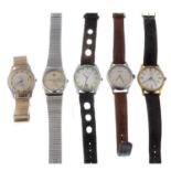 A group of five assorted watches, to include an example by Longines and Rado.